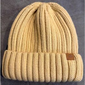 Unisex cuffed beanie with soft lining. New without tags